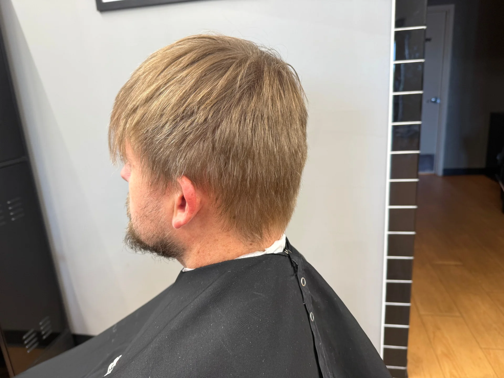 Client before haircut at Hair Ambition mobile barber in Goodyear, AZ